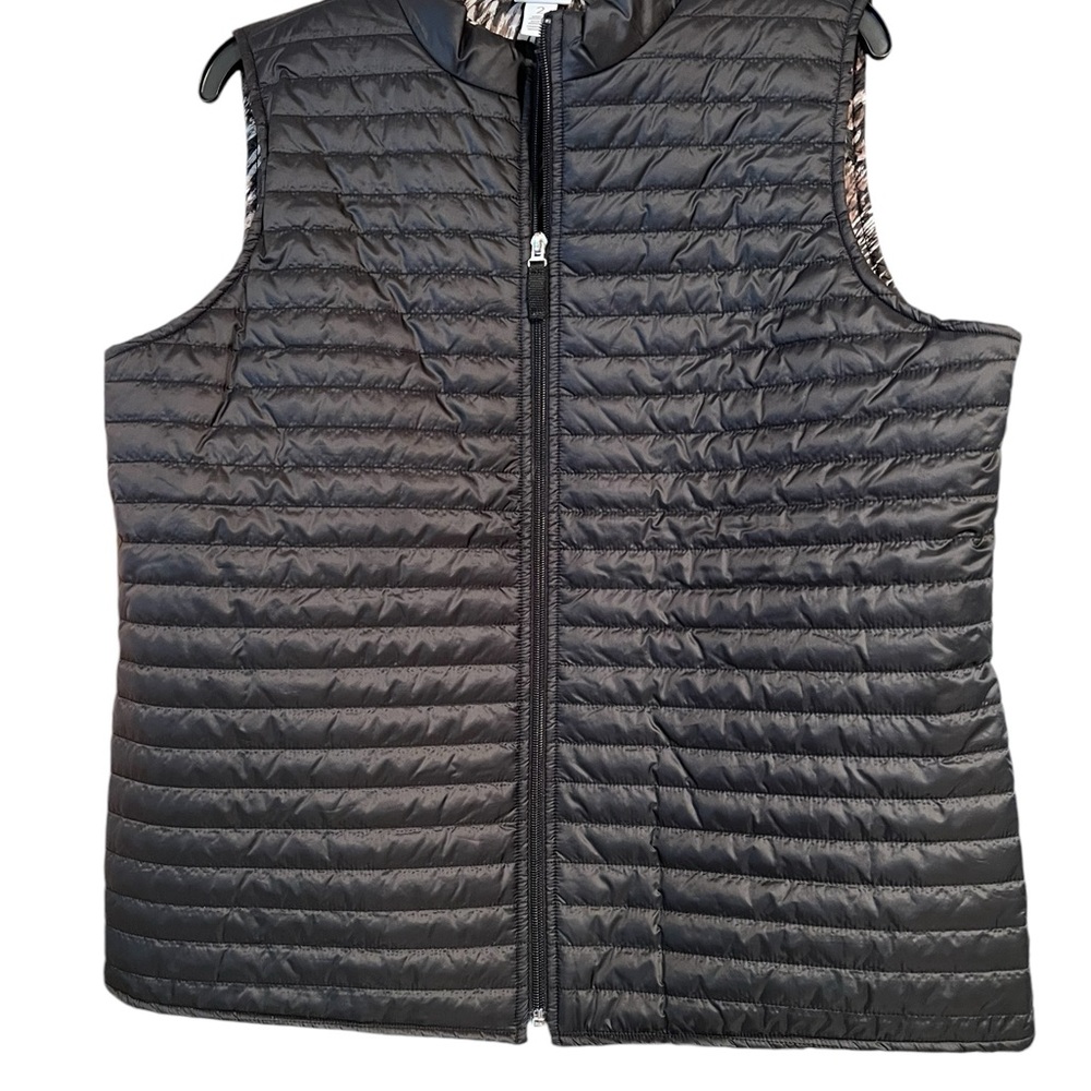 Chico’s light weight quilted black vest never worn size 2